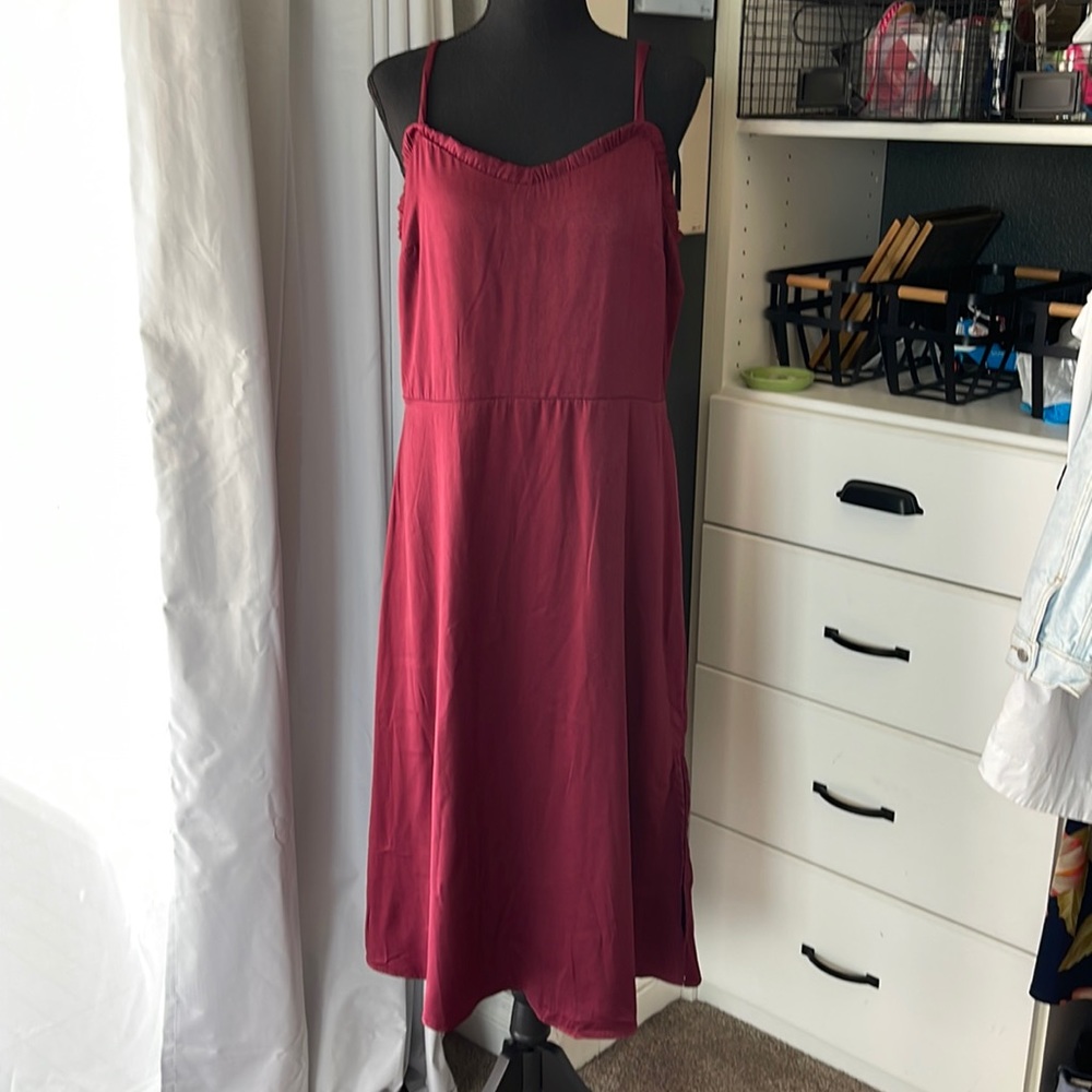 NWT Loft size 12 dress. Beautiful silky feel. Color is a red wine/burgundy color